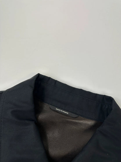 Hermès brown and navy jacket with leather straps and buttons, vintage 2000s design.