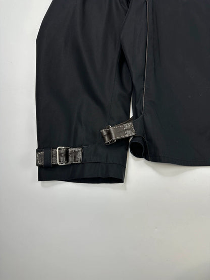 Hermès brown and navy jacket with leather straps and buttons, vintage 2000s design.
