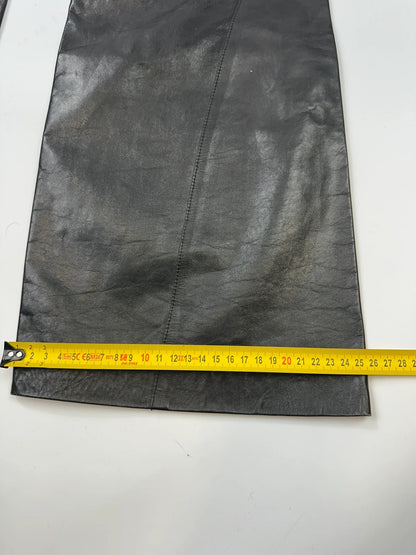Marithé François Girbaud black flared leather-look trousers with soft texture and vintage design.
