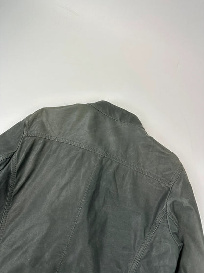 John Galliano khaki green leather jacket with side zip and soft texture.