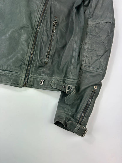 John Galliano khaki green leather jacket with side zip and soft texture.
