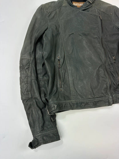 John Galliano khaki green leather jacket with side zip and soft texture.