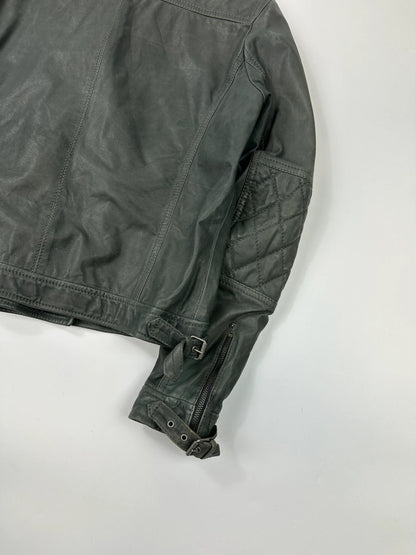 John Galliano khaki green leather jacket with side zip and soft texture.
