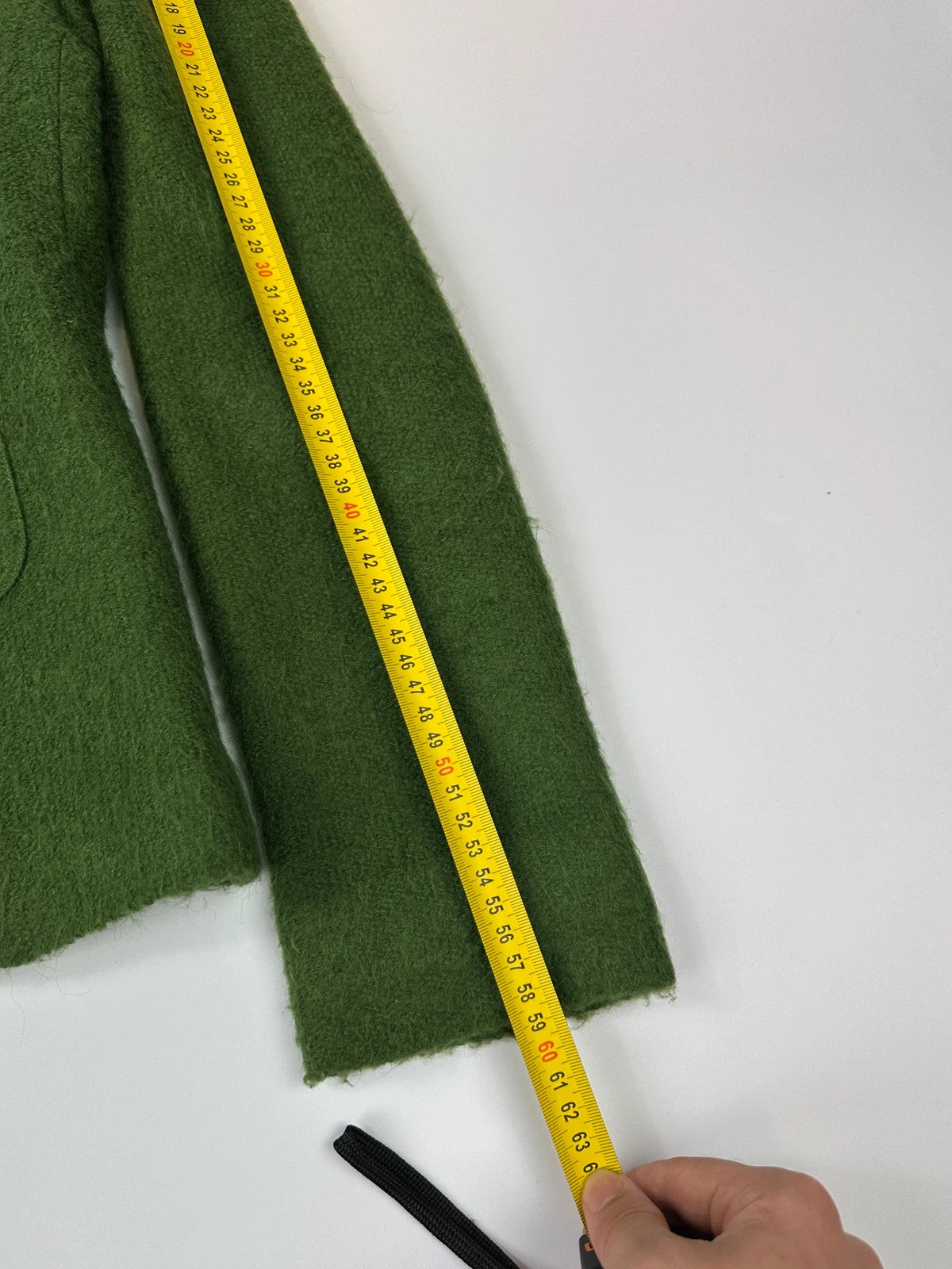Kenzo green mohair skirt suit set with adjustable wrap skirt and logo detail.