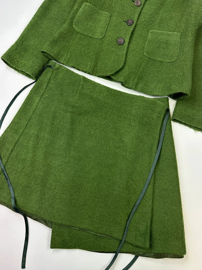Kenzo green mohair skirt suit set with adjustable wrap skirt and logo detail.