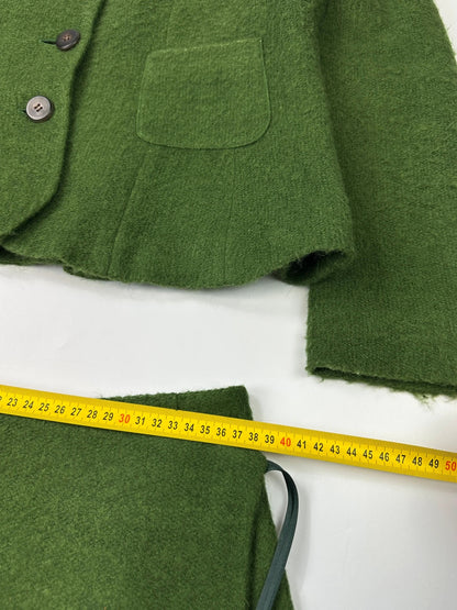 Kenzo green mohair skirt suit set with adjustable wrap skirt and logo detail.