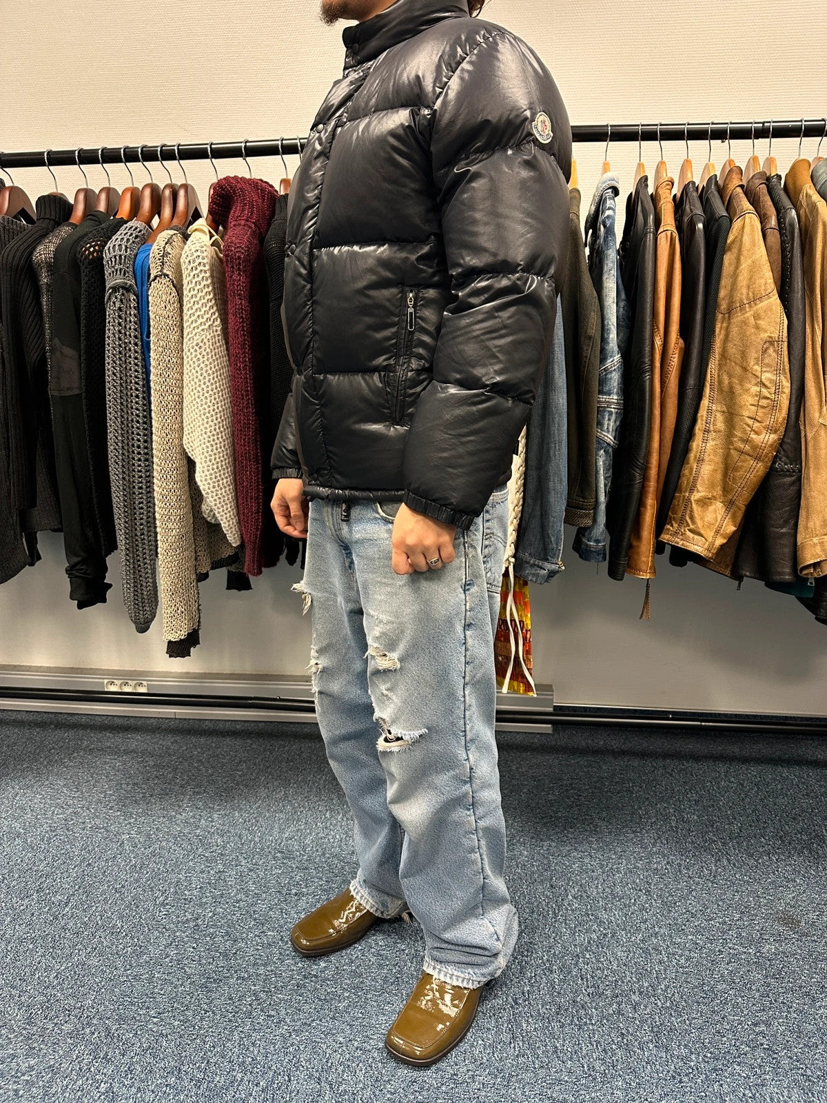 Moncler black nylon hooded puffer jacket with vintage logo and down filling.