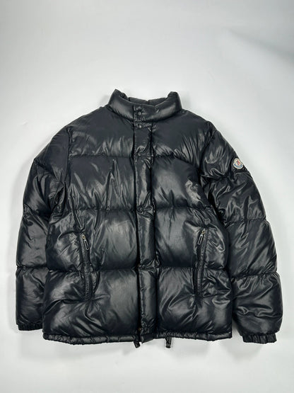 Moncler black nylon hooded puffer jacket with vintage logo and down filling.