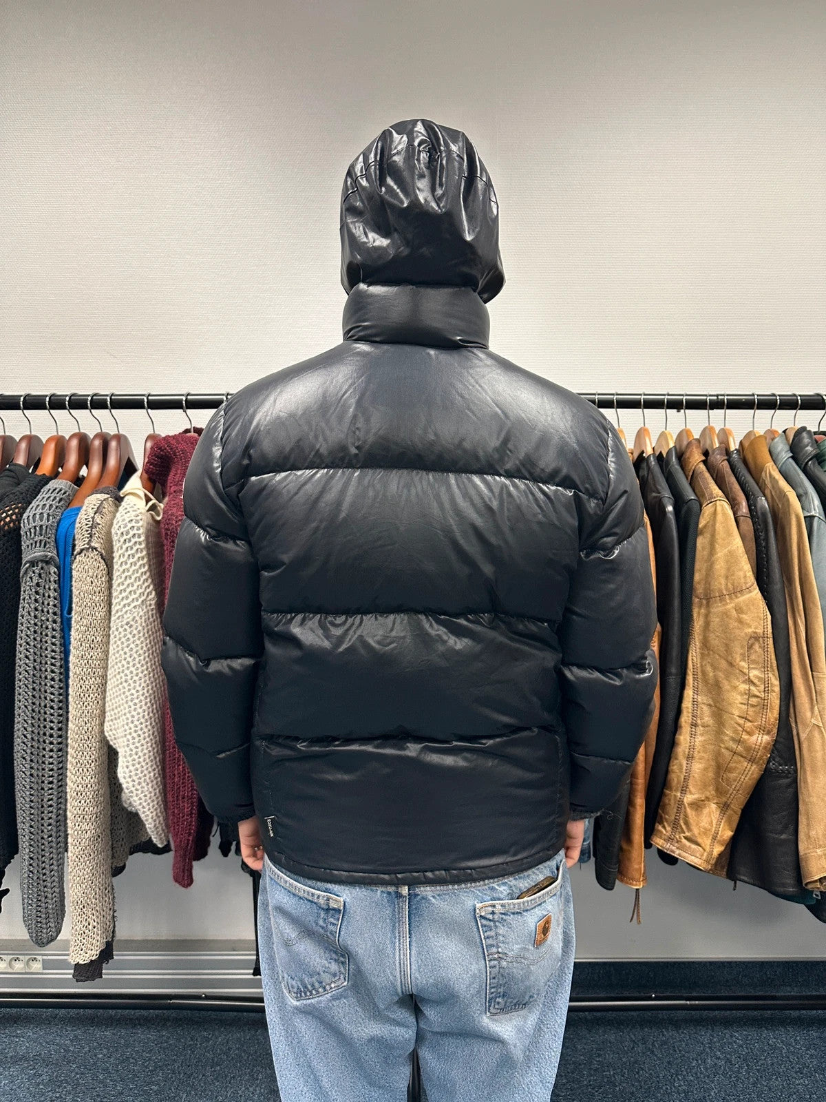 Moncler black nylon hooded puffer jacket with vintage logo and down filling.