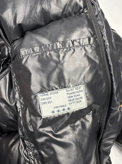 Moncler black nylon hooded puffer jacket with vintage logo and down filling.
