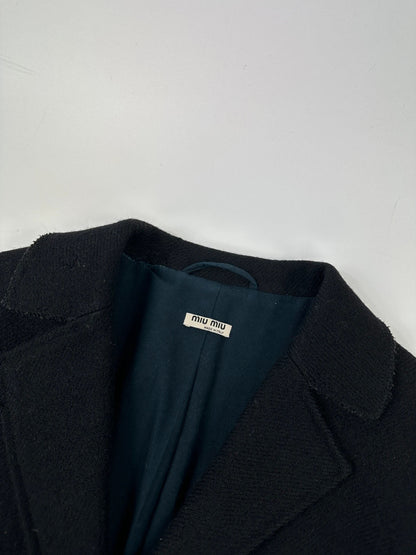 Miu Miu black trench coat in wool and mohair with vintage logo detail.