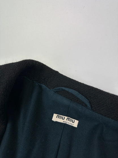 Miu Miu black trench coat in wool and mohair with vintage logo detail.