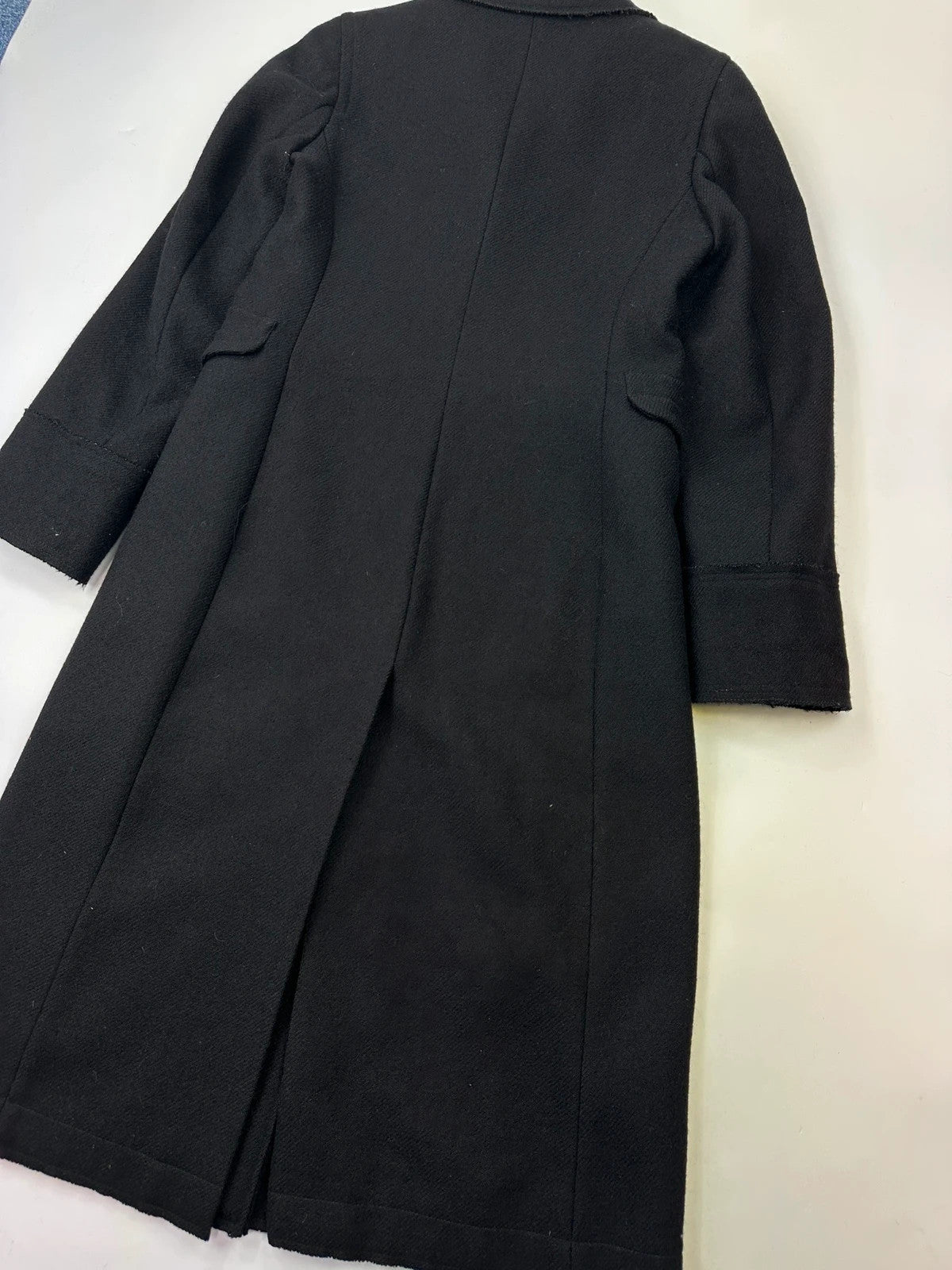 Miu Miu black trench coat in wool and mohair with vintage logo detail.