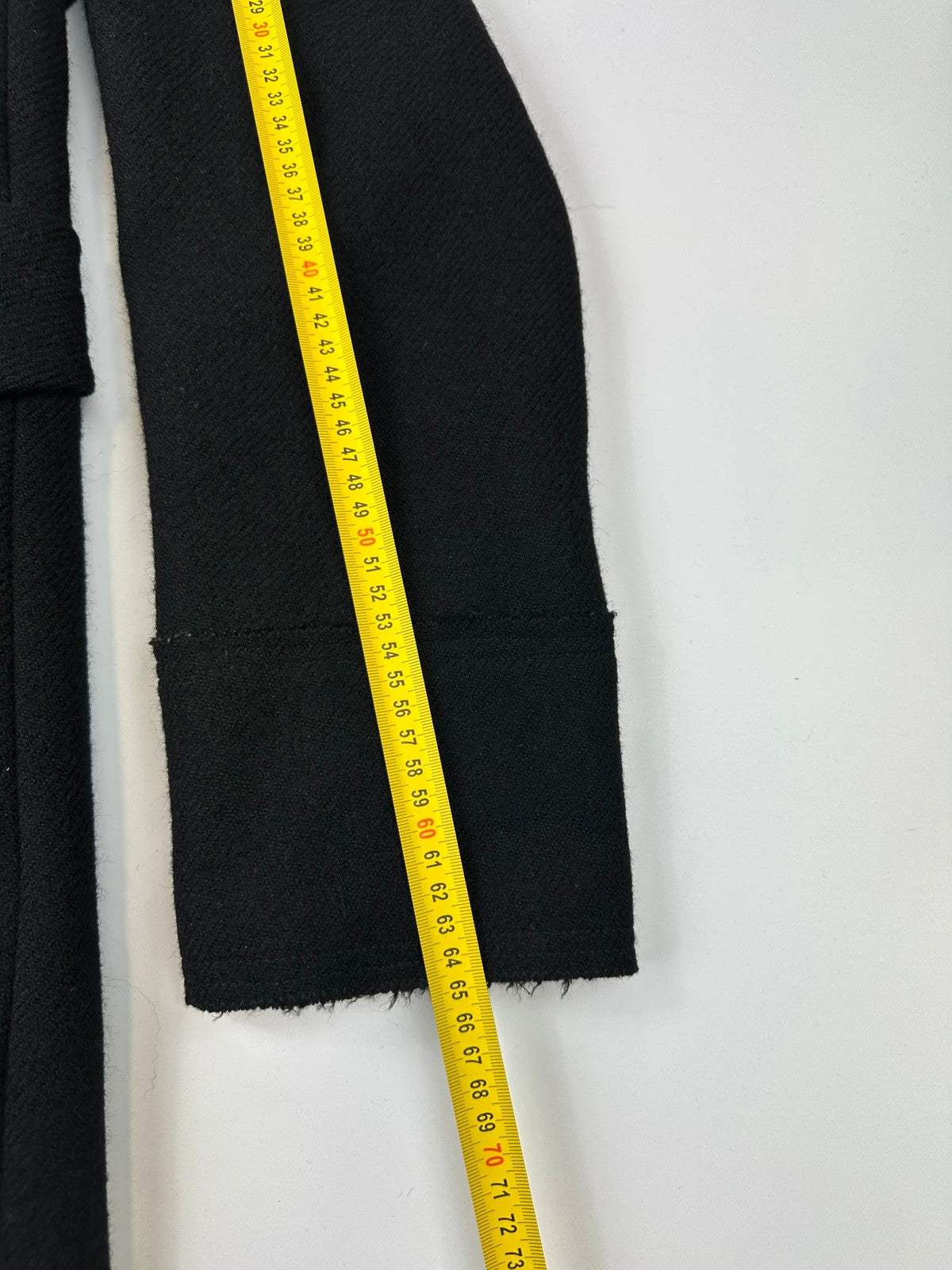 Miu Miu black trench coat in wool and mohair with vintage logo detail.