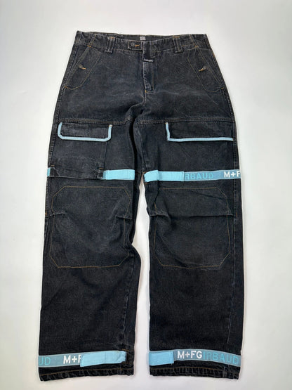 Marithé François Girbaud black wide-leg trousers with turquoise accents and cargo pockets.