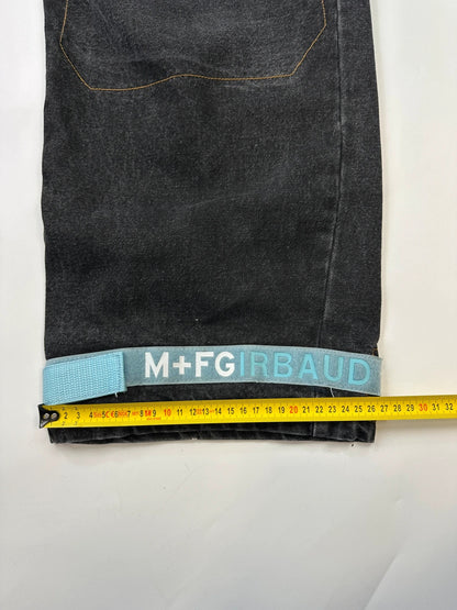 Marithé François Girbaud black and turquoise baggy denim trousers with cargo pockets and velcro details.