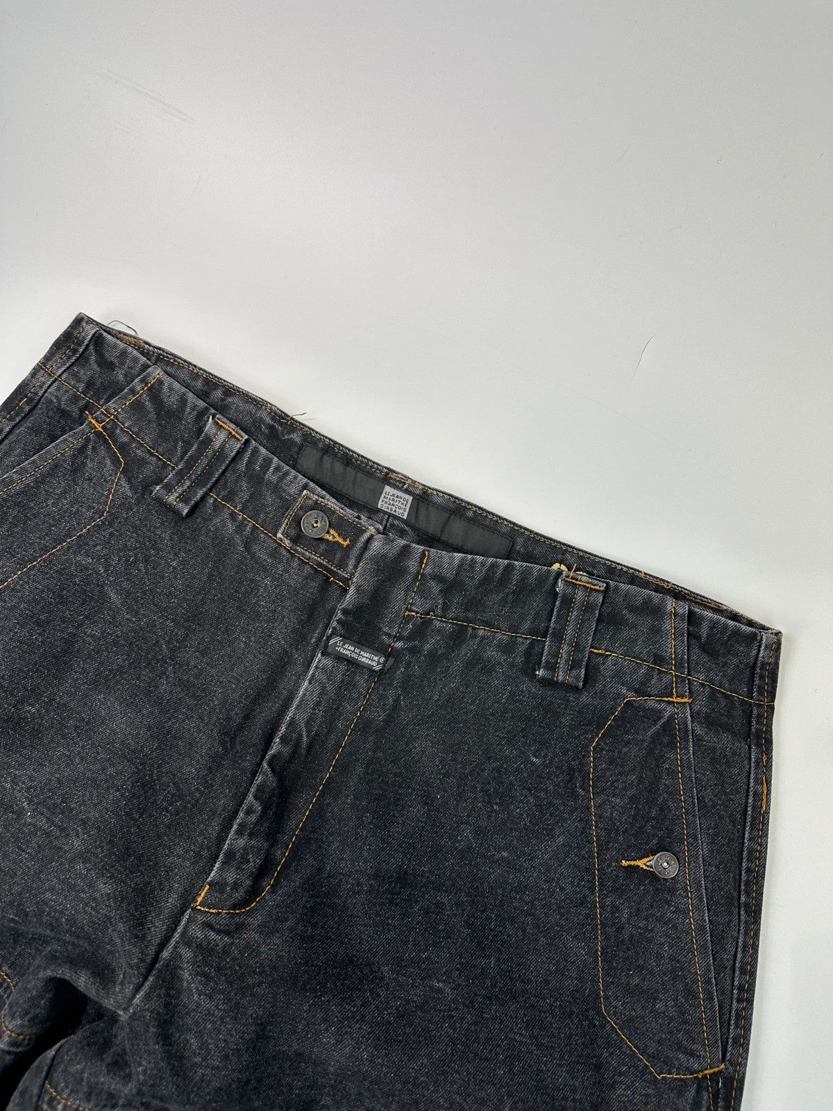 Marithé François Girbaud black and turquoise baggy denim trousers with cargo pockets and velcro details.