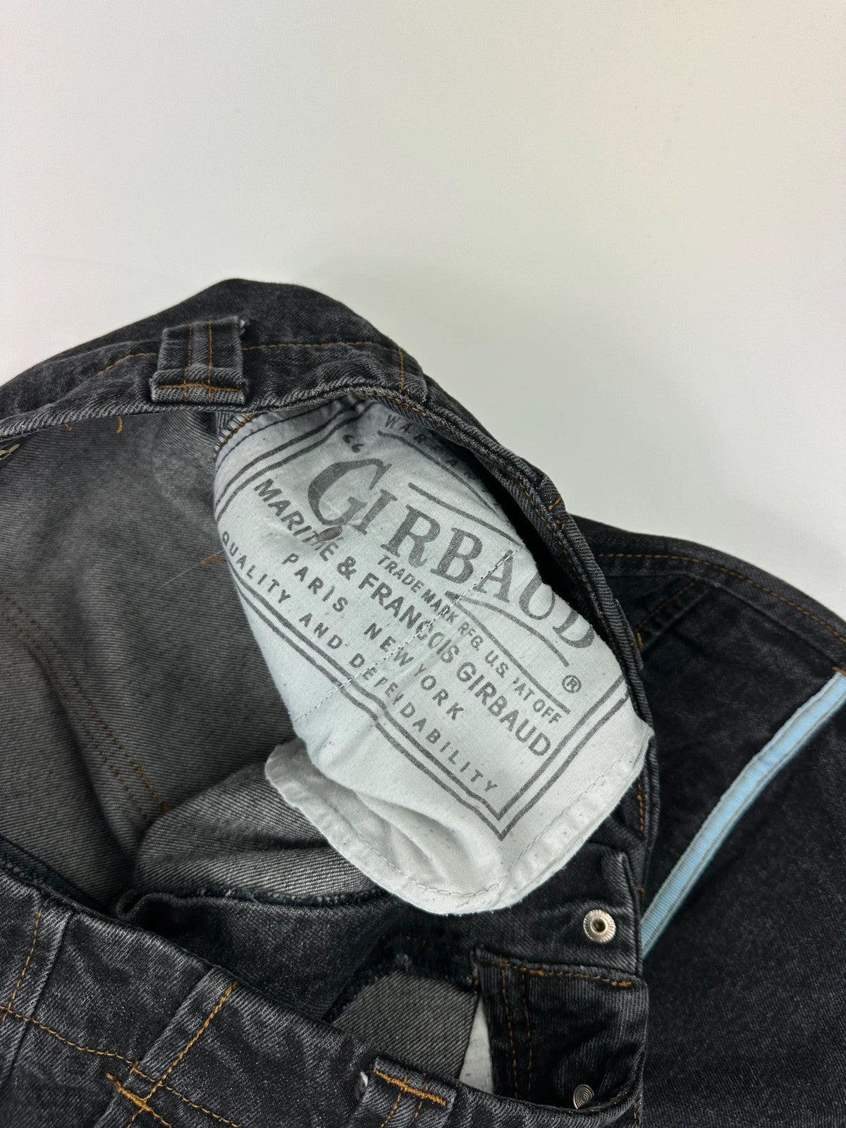 Marithé François Girbaud black and turquoise baggy denim trousers with cargo pockets and velcro details.