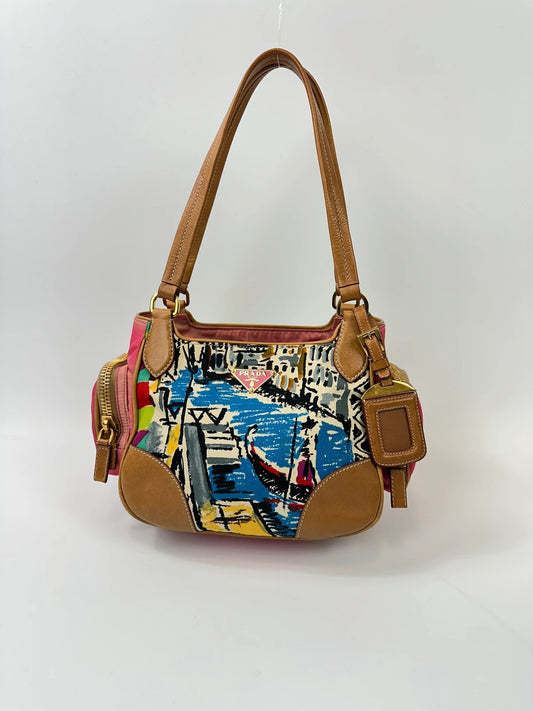 Prada multi pink handbag featuring Venezia painting, leather and canvas material.