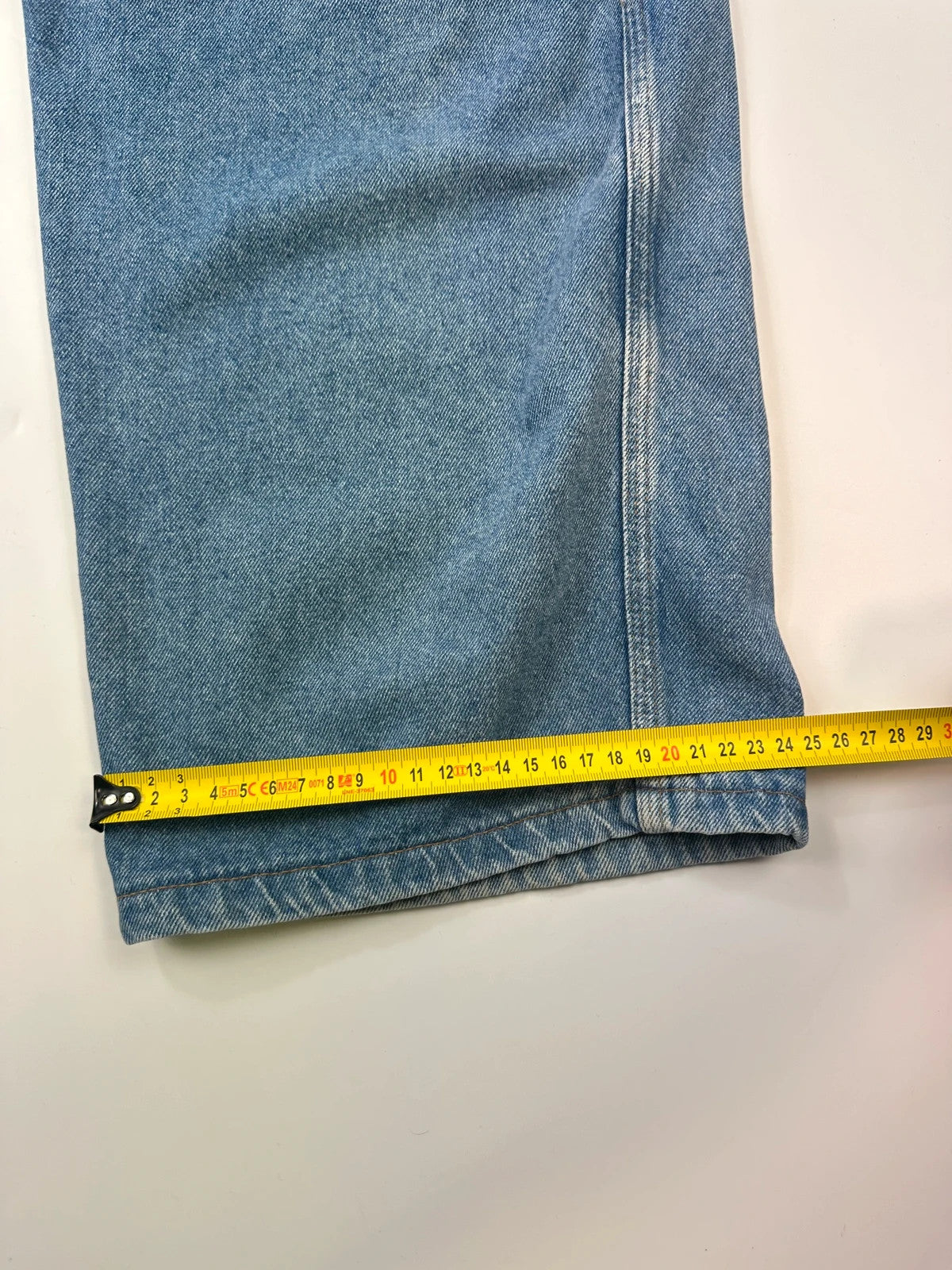 Marithé François Girbaud light blue high waisted wide leg jeans with stone washed finish.