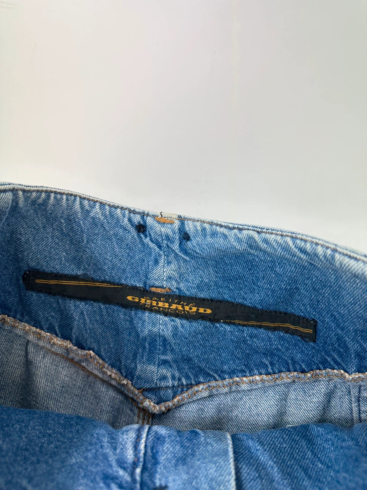 Marithé François Girbaud light blue high waisted wide leg jeans with stone washed finish.
