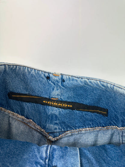 Marithé François Girbaud light blue high waisted wide leg jeans with stone washed finish.
