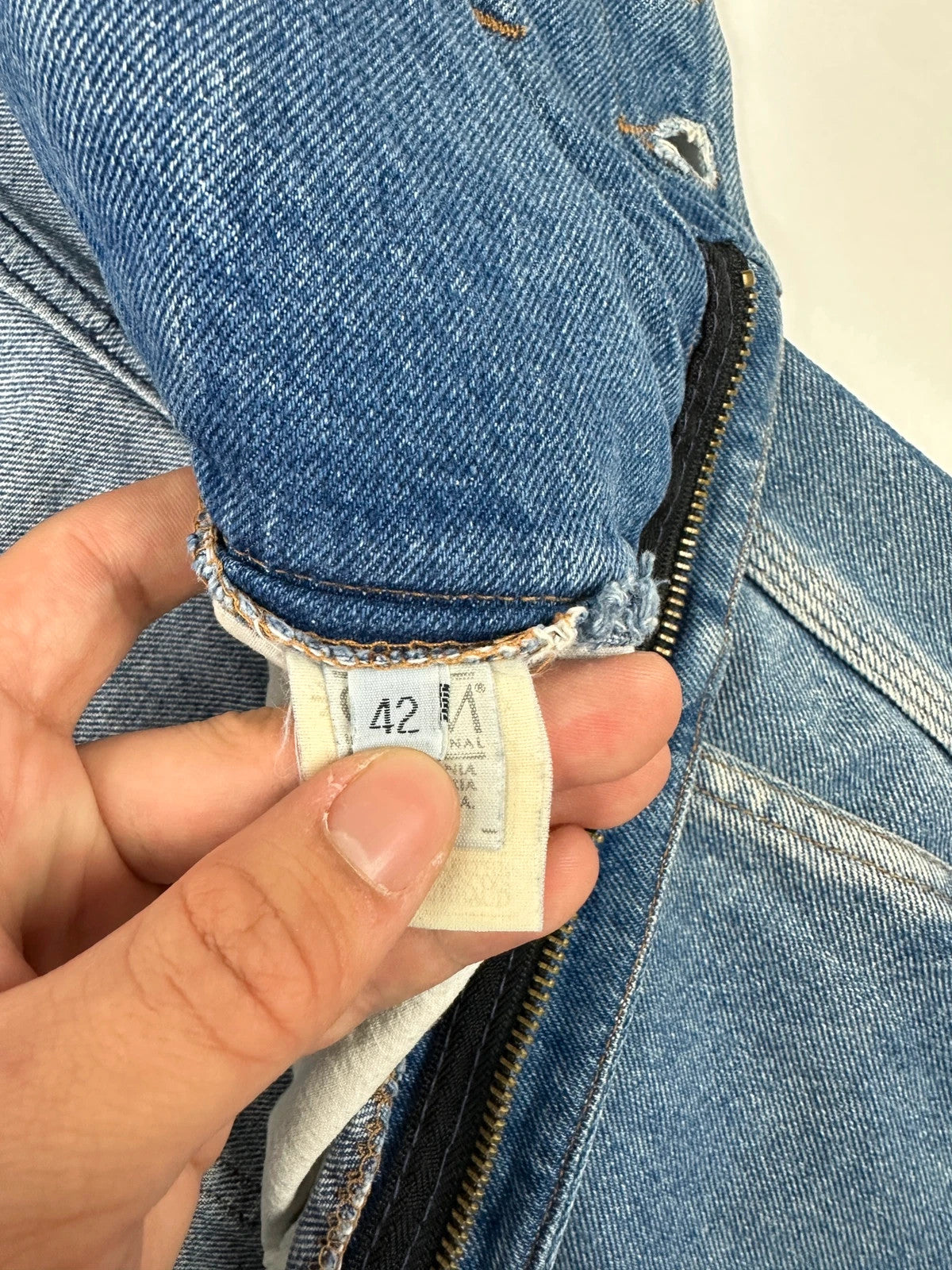 Marithé François Girbaud light blue high waisted wide leg jeans with stone washed finish.