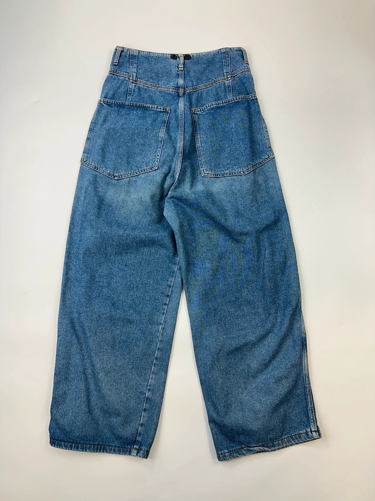 Marithé François Girbaud light blue high waisted wide leg jeans with stone washed finish.
