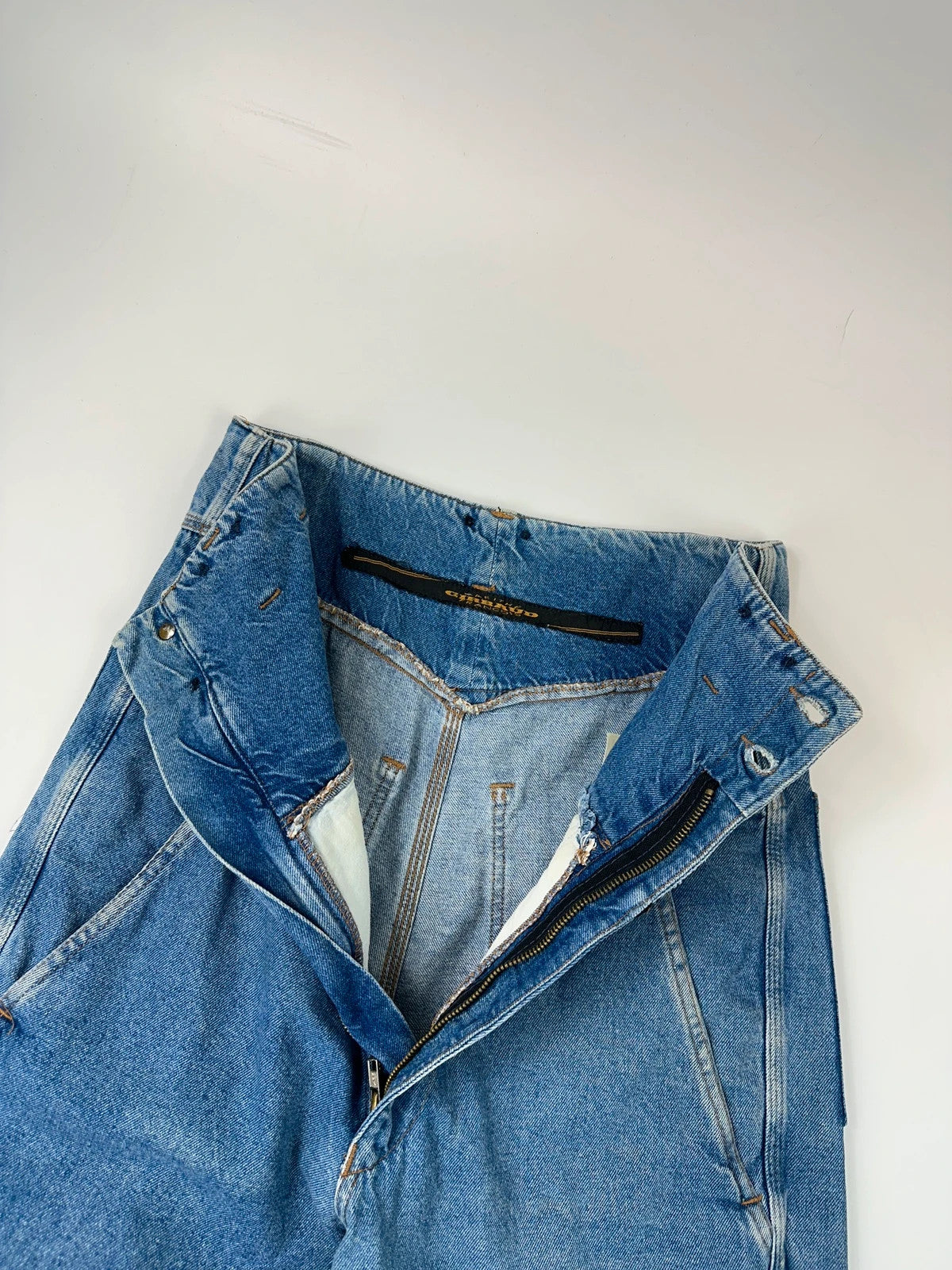 Marithé François Girbaud light blue high waisted wide leg jeans with stone washed finish.