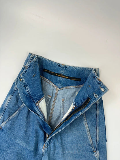 Marithé François Girbaud light blue high waisted wide leg jeans with stone washed finish.
