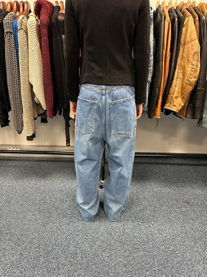 Marithé François Girbaud light blue high waisted wide leg jeans with stone washed finish.