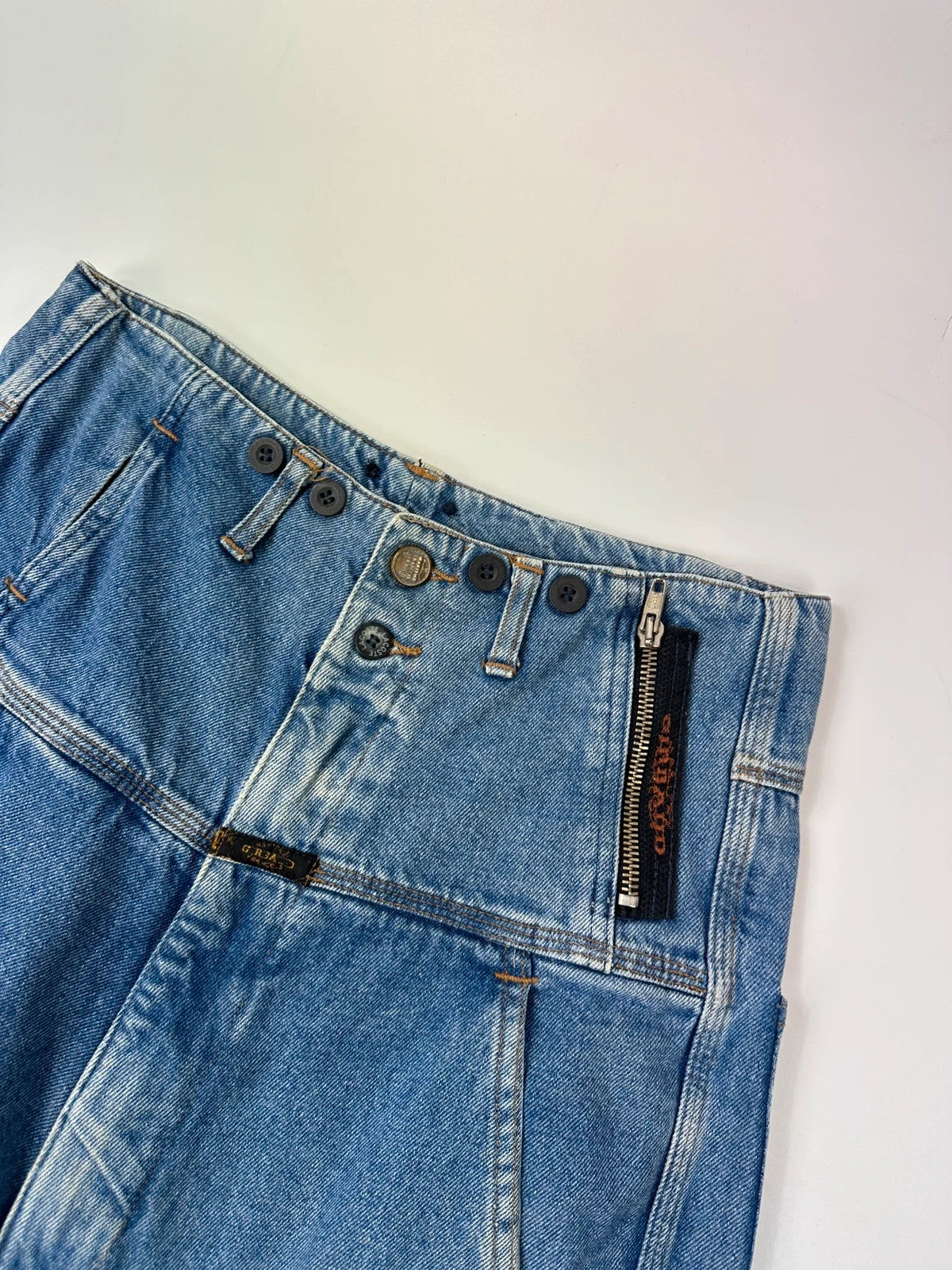 Marithé François Girbaud light blue high waisted wide leg jeans with stone washed finish.