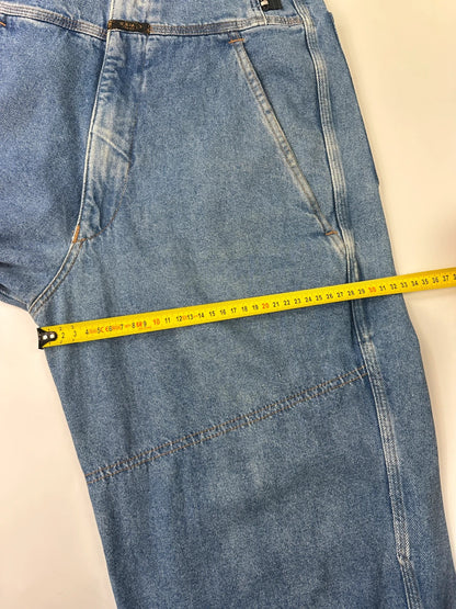 Marithé François Girbaud light blue high waisted wide leg jeans with stone washed finish.