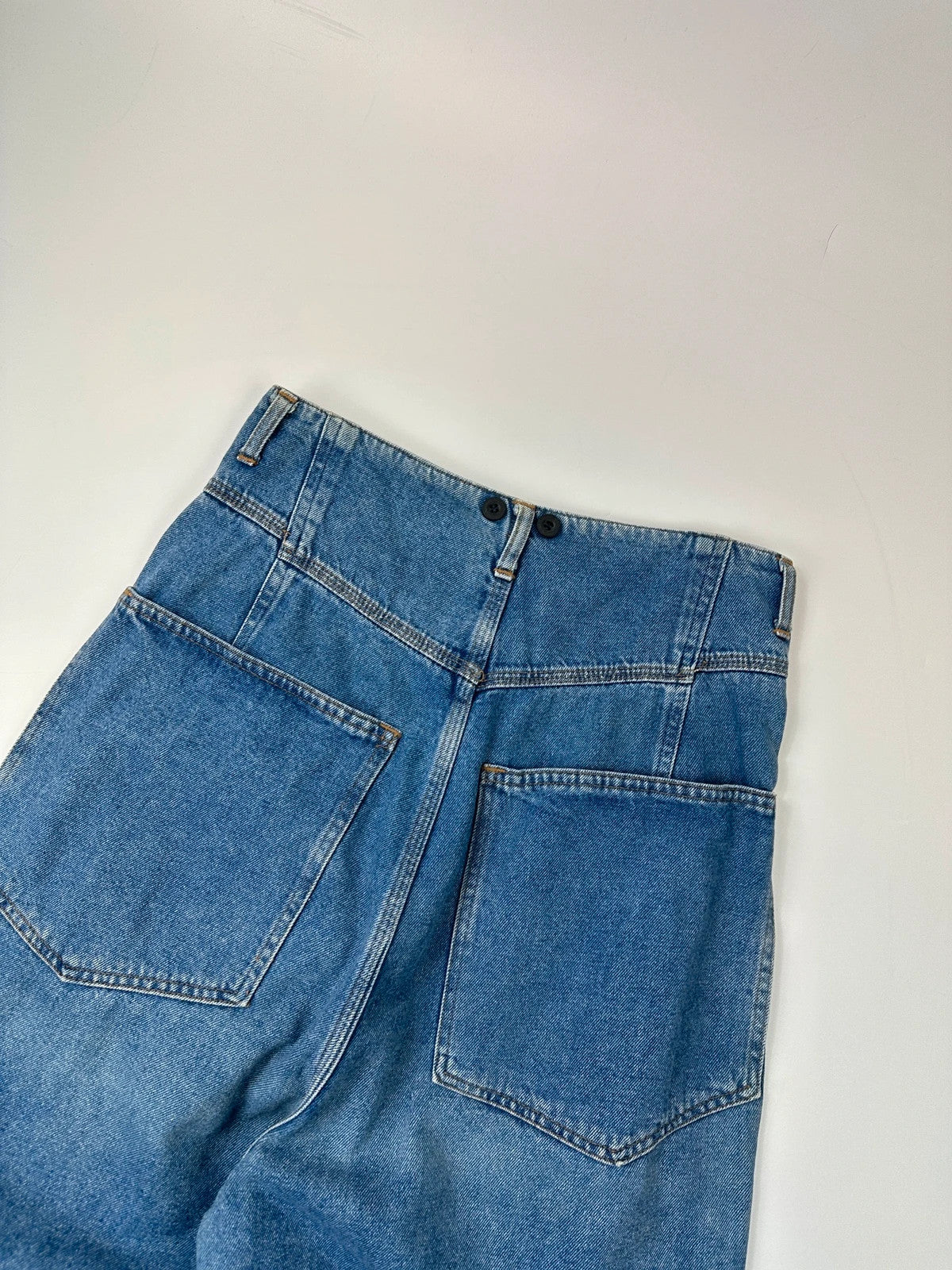 Marithé François Girbaud light blue high waisted wide leg jeans with stone washed finish.