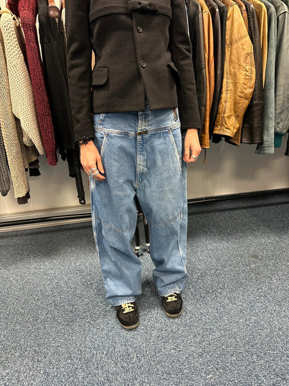 Marithé François Girbaud light blue high waisted wide leg jeans with stone washed finish.