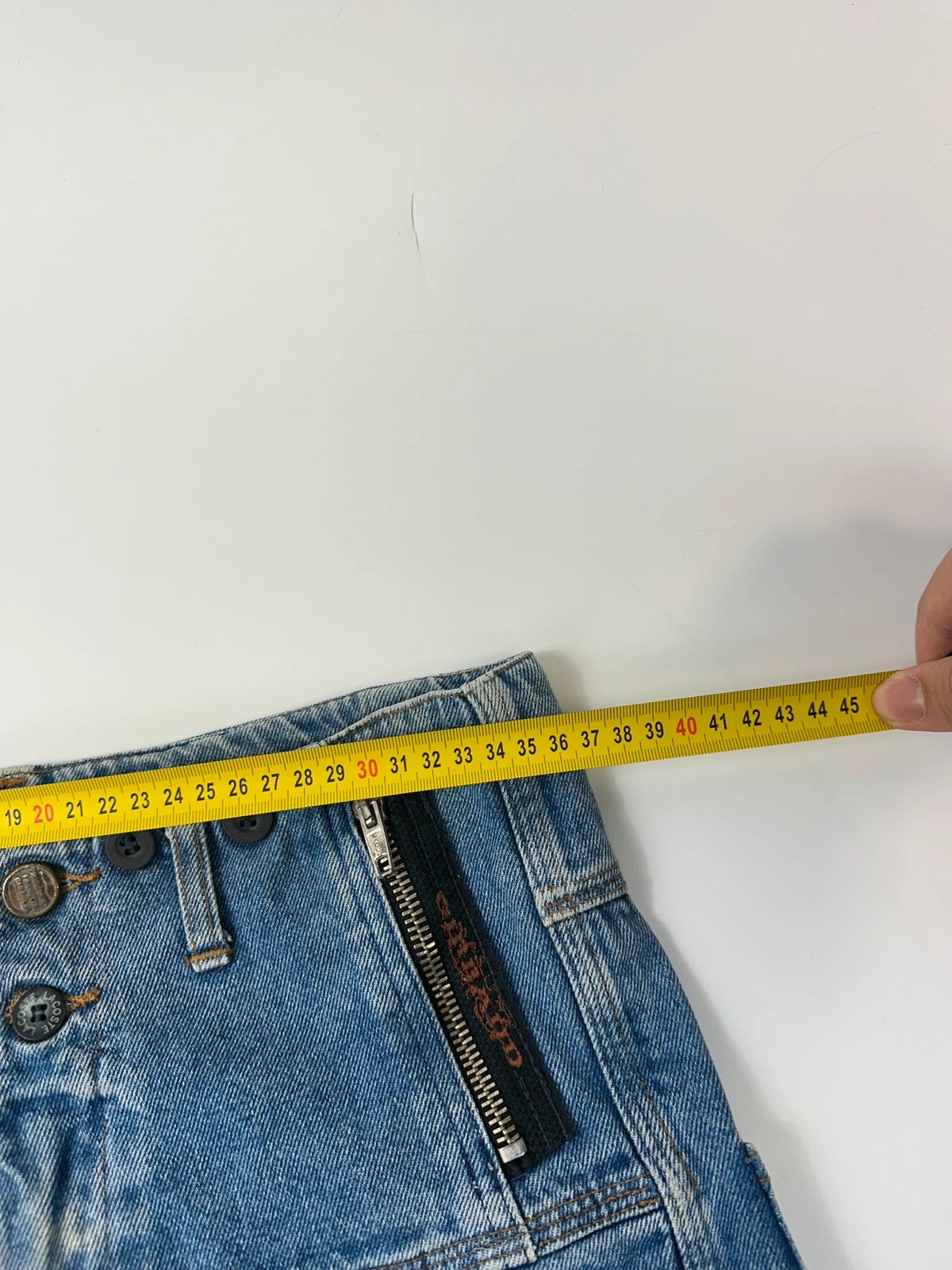 Marithé François Girbaud light blue high waisted wide leg jeans with stone washed finish.