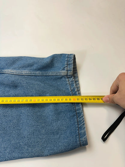 Marithé François Girbaud light blue high waisted wide leg jeans with stone washed finish.