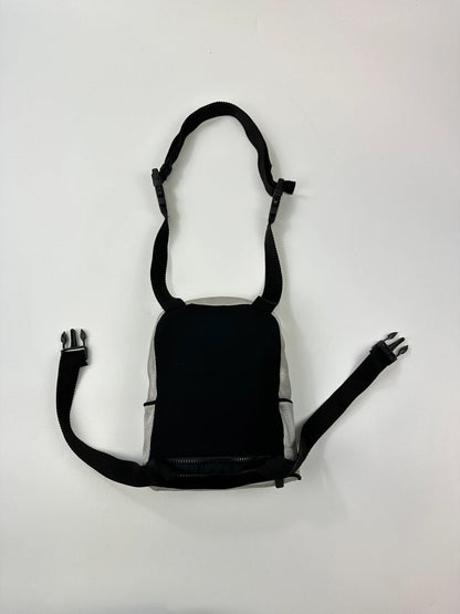Miu Miu grey mesh 2in1 chest bag backpack, faded logo, minimalist design.