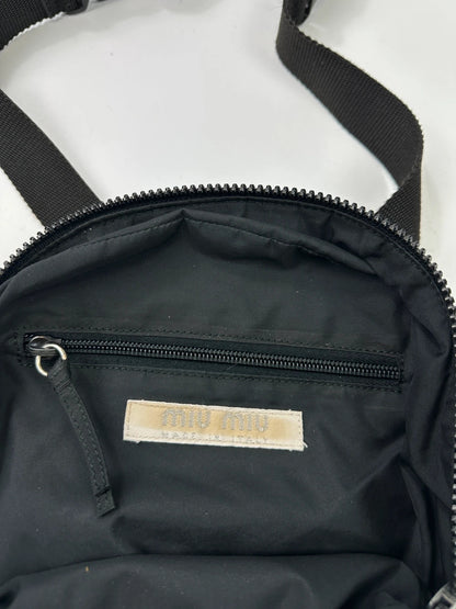 Miu Miu grey mesh 2in1 chest bag backpack, faded logo, minimalist design.