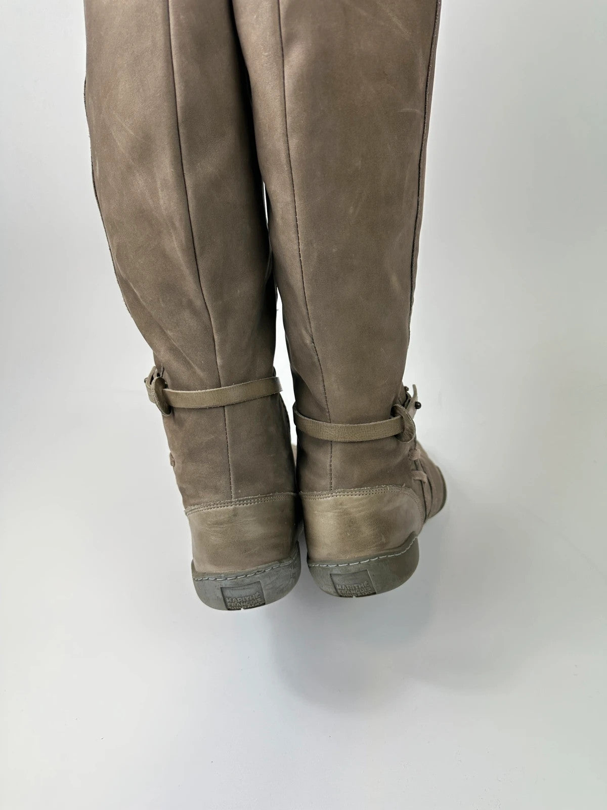 Marithé François Girbaud khaki brown leather knee-high boots with straps and vintage design.