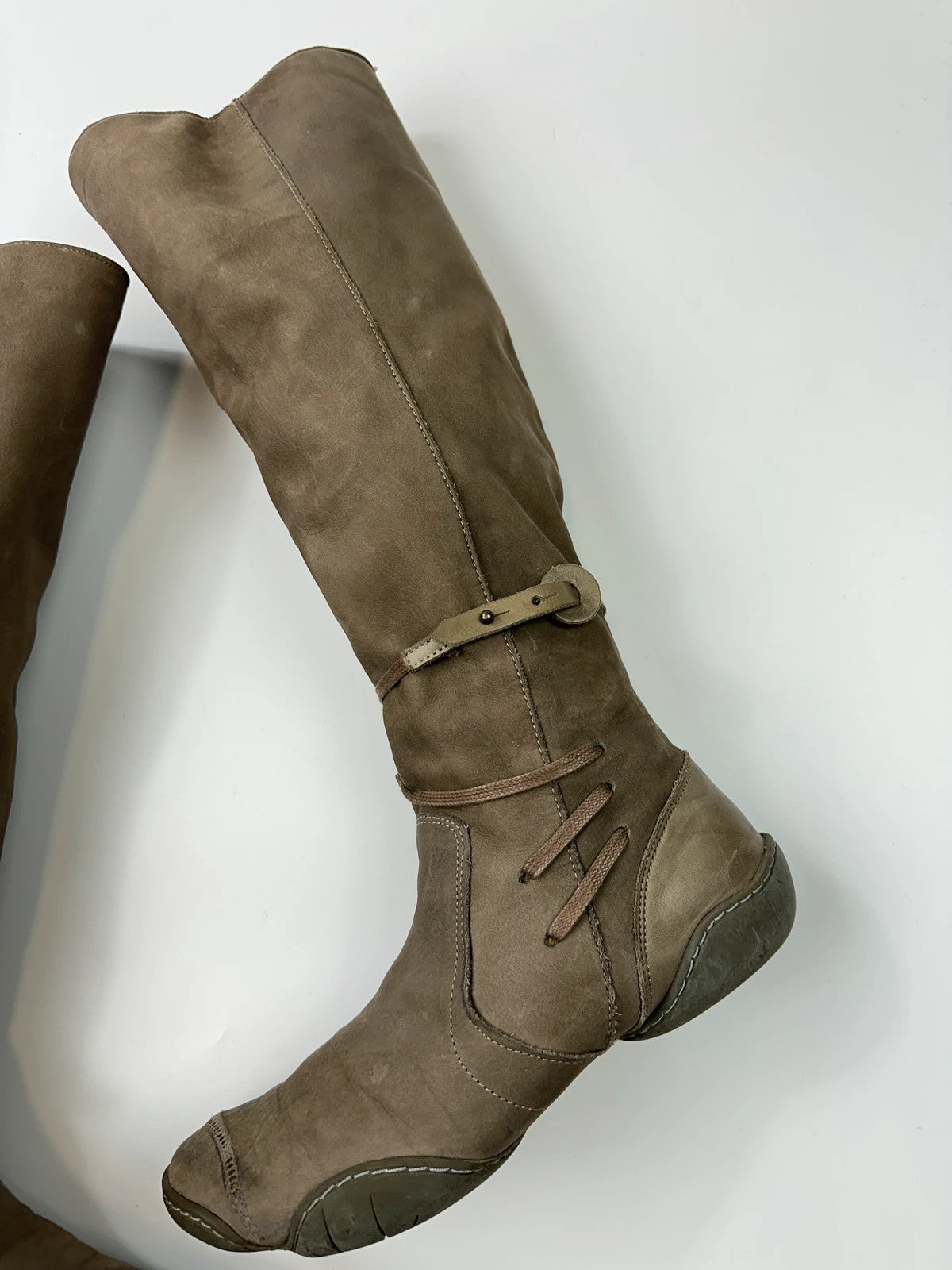 Marithé François Girbaud khaki brown leather knee-high boots with straps and vintage design.