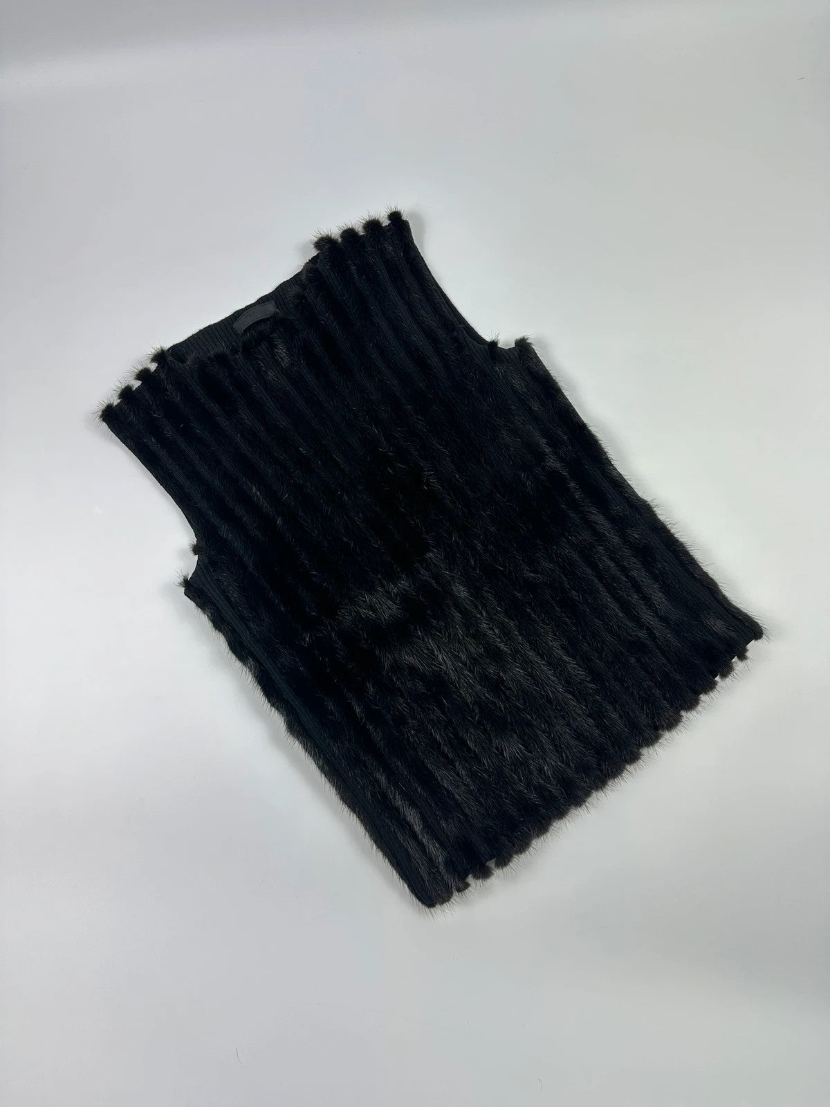 Prada black mink fur and wool tank top vest with minimalist design.