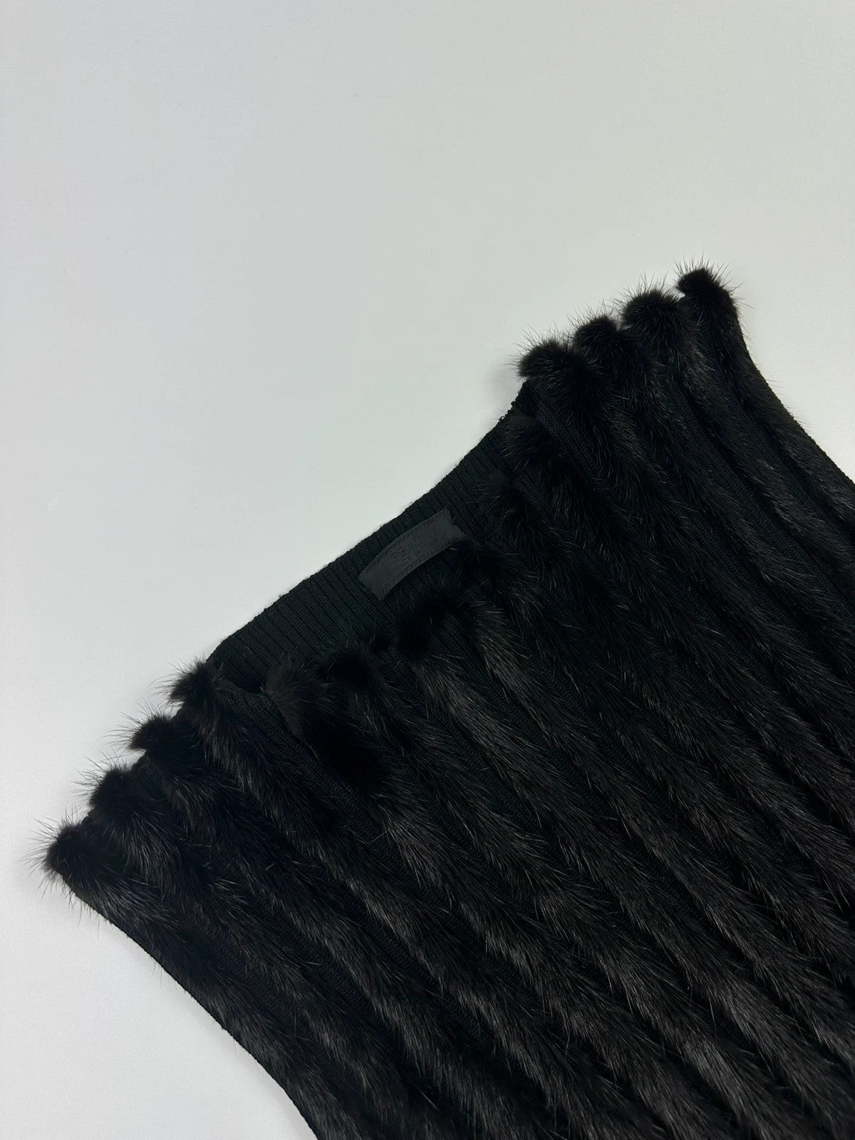 Prada black mink fur and wool tank top vest with minimalist design.