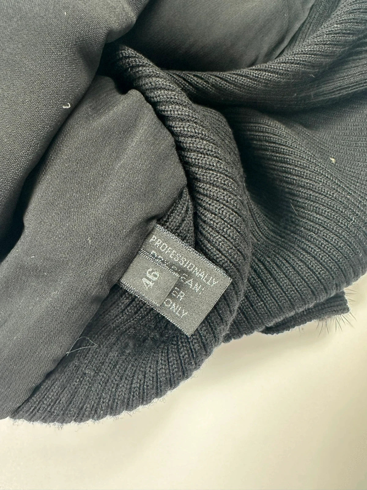 Prada black mink fur and wool tank top vest with minimalist design.