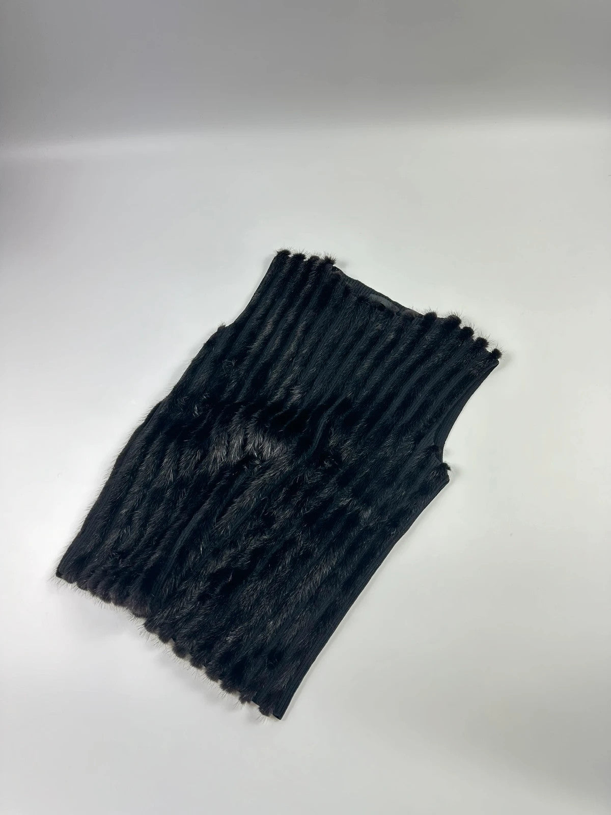 Prada black mink fur and wool tank top vest with minimalist design.