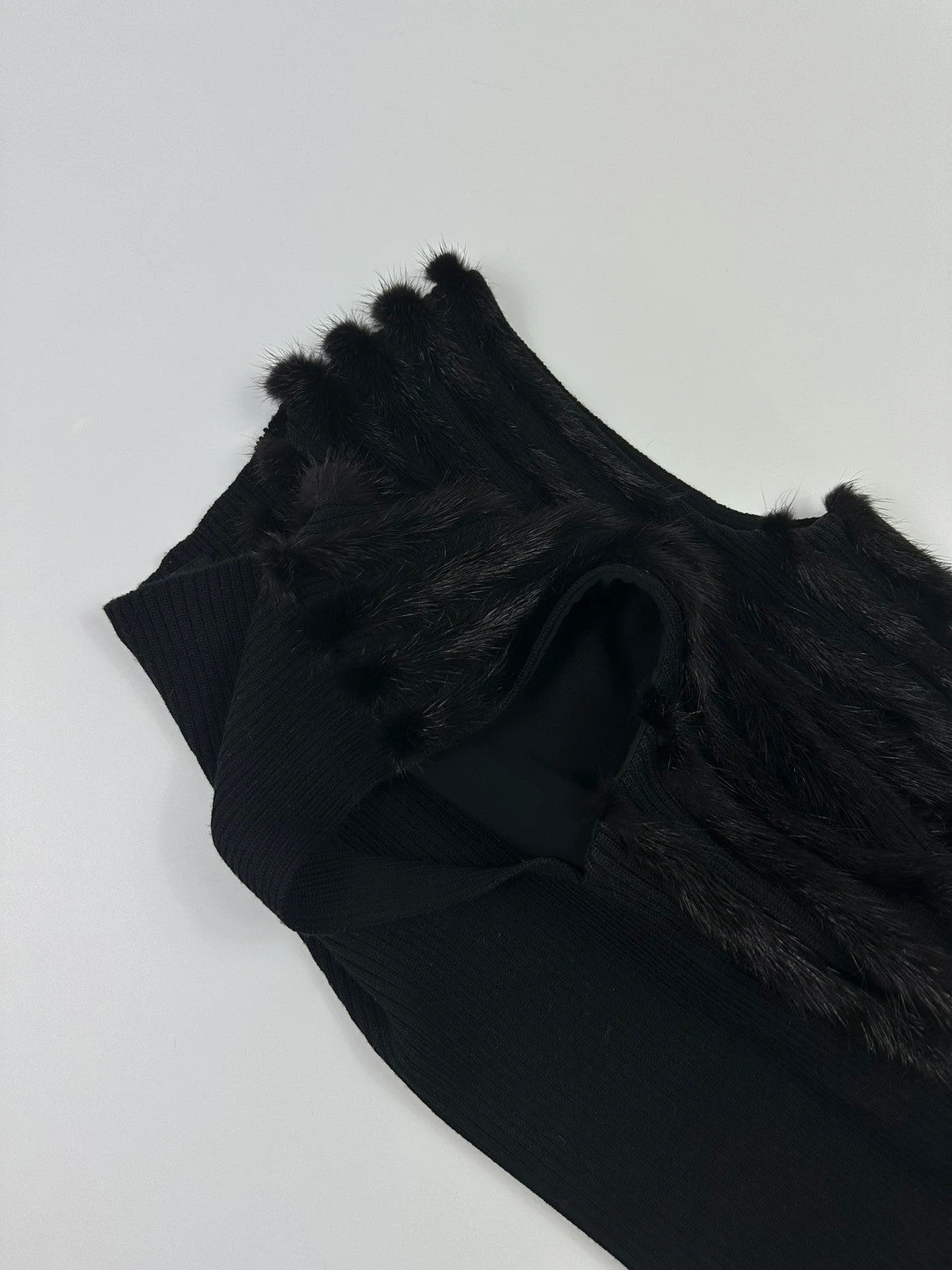 Prada black mink fur and wool tank top vest with minimalist design.