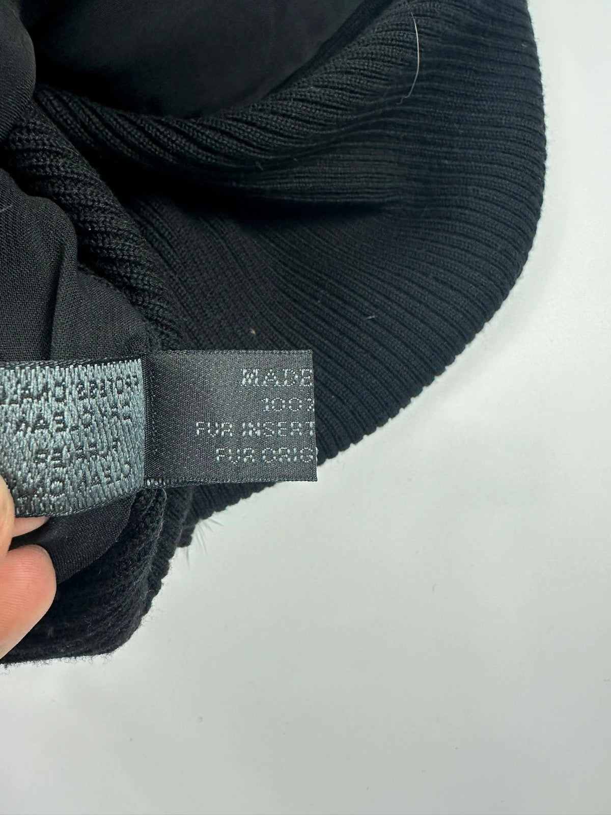 Prada black mink fur and wool tank top vest with minimalist design.