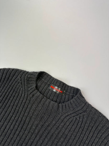 Prada grey ribbed wool knit sweater with elbow seam detailing from FW2004 collection.