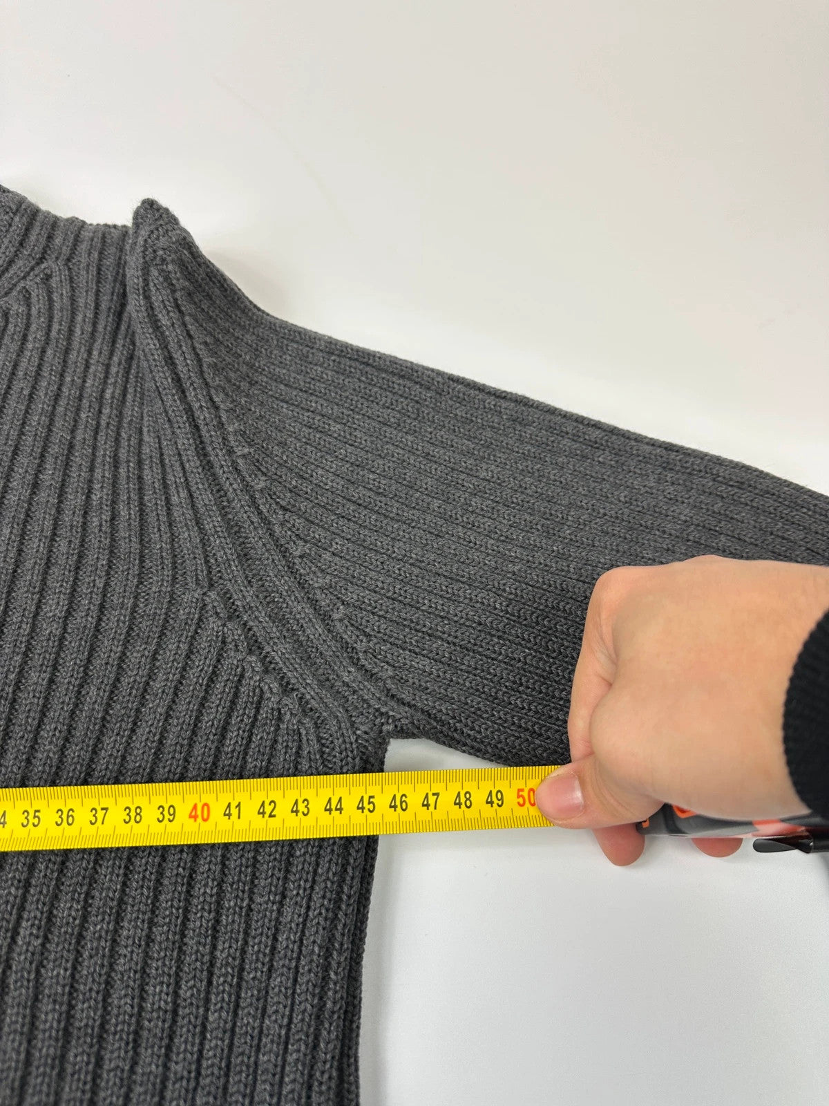Prada grey ribbed wool knit sweater with elbow seam detailing from FW2004 collection.