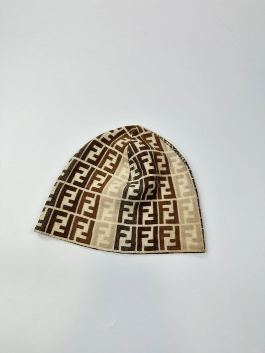 Fendi beige brown beanie featuring iconic monogram pattern and soft wool material.
